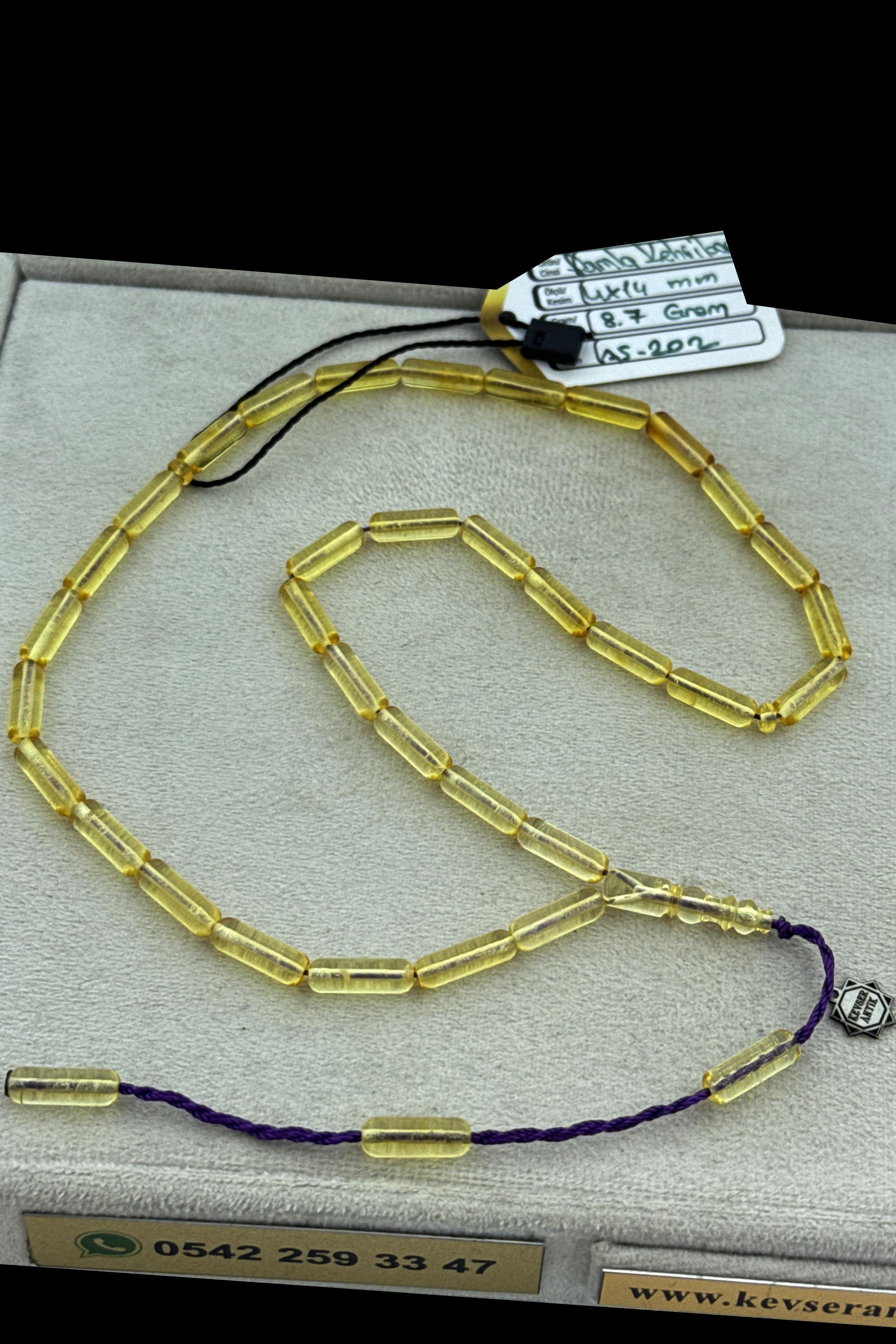 Şeffaf Litvanya Amber TesbihŞeffaf Litvanya Amber Tesbih - Kevser AntikDamla Kehribar Tesbihler