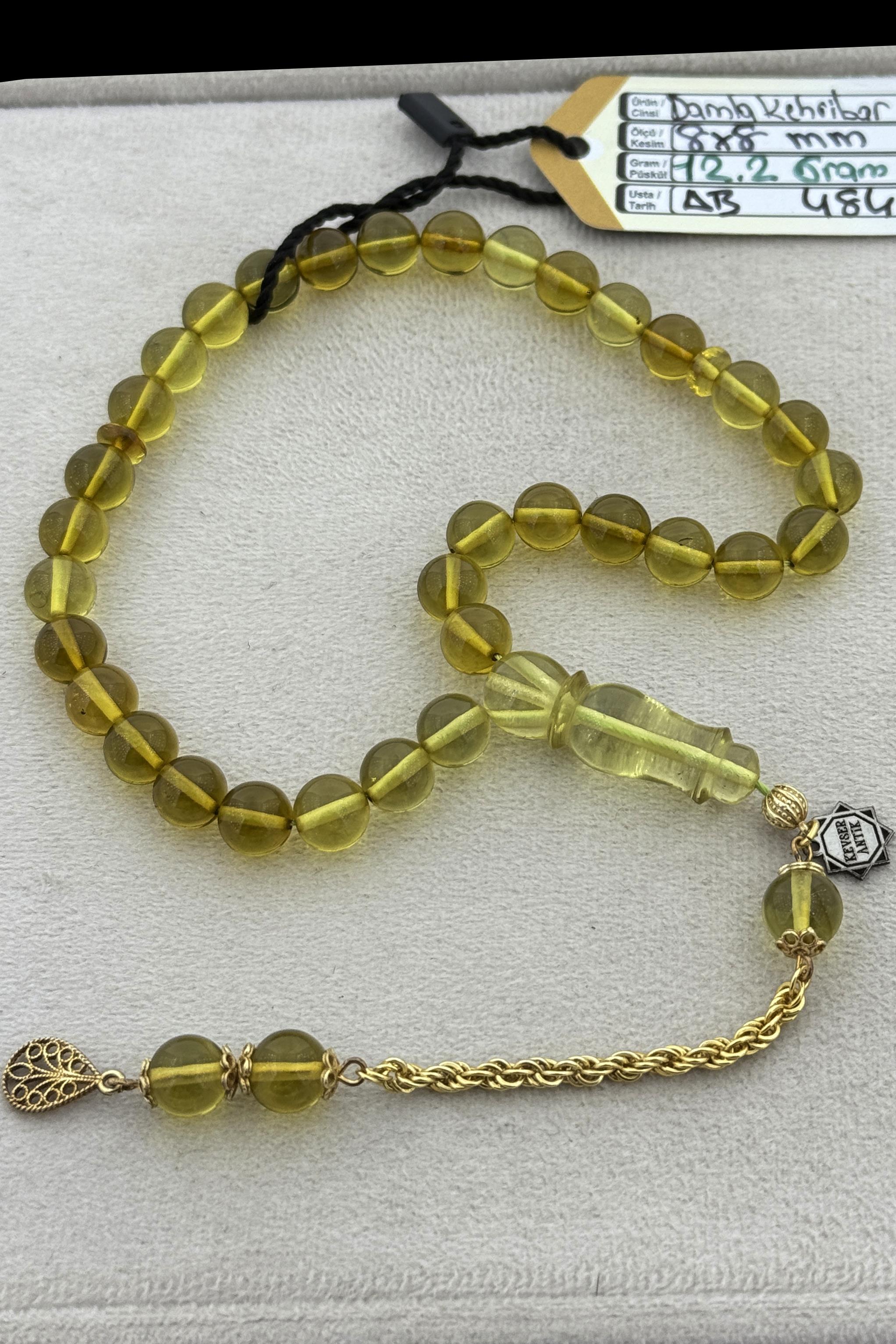 Şeffaf Parça Yeşil Damla Kehribar TesbihŞeffaf Parça Yeşil Damla Kehribar Tesbih - Kevser AntikDamla Kehribar Tesbihler