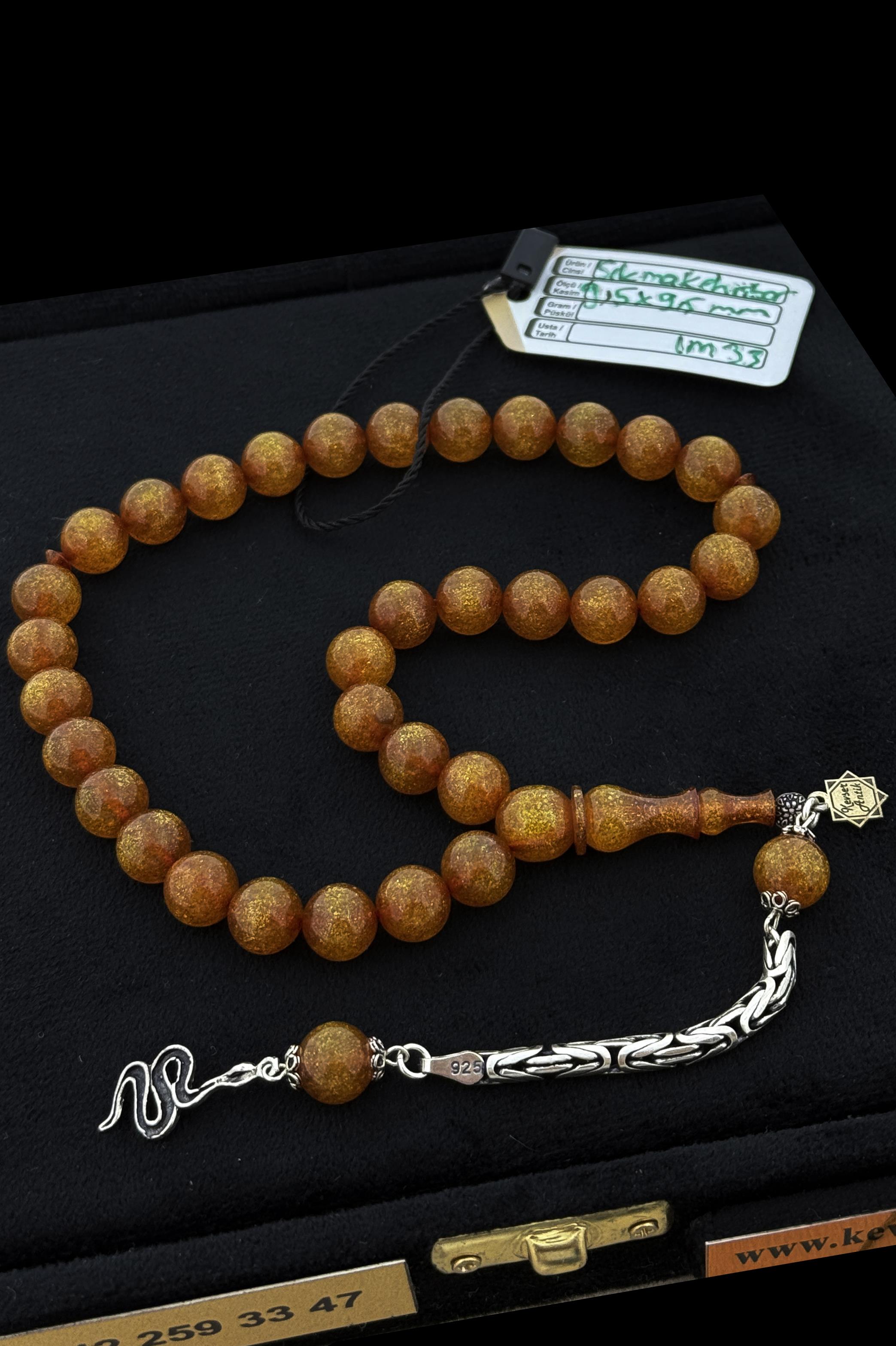 Simli Sıkma Kehribar TesbihSimli Sıkma Kehribar Tesbih - Kevser AntikSıkma-Ateş Kehribar Tesbihler