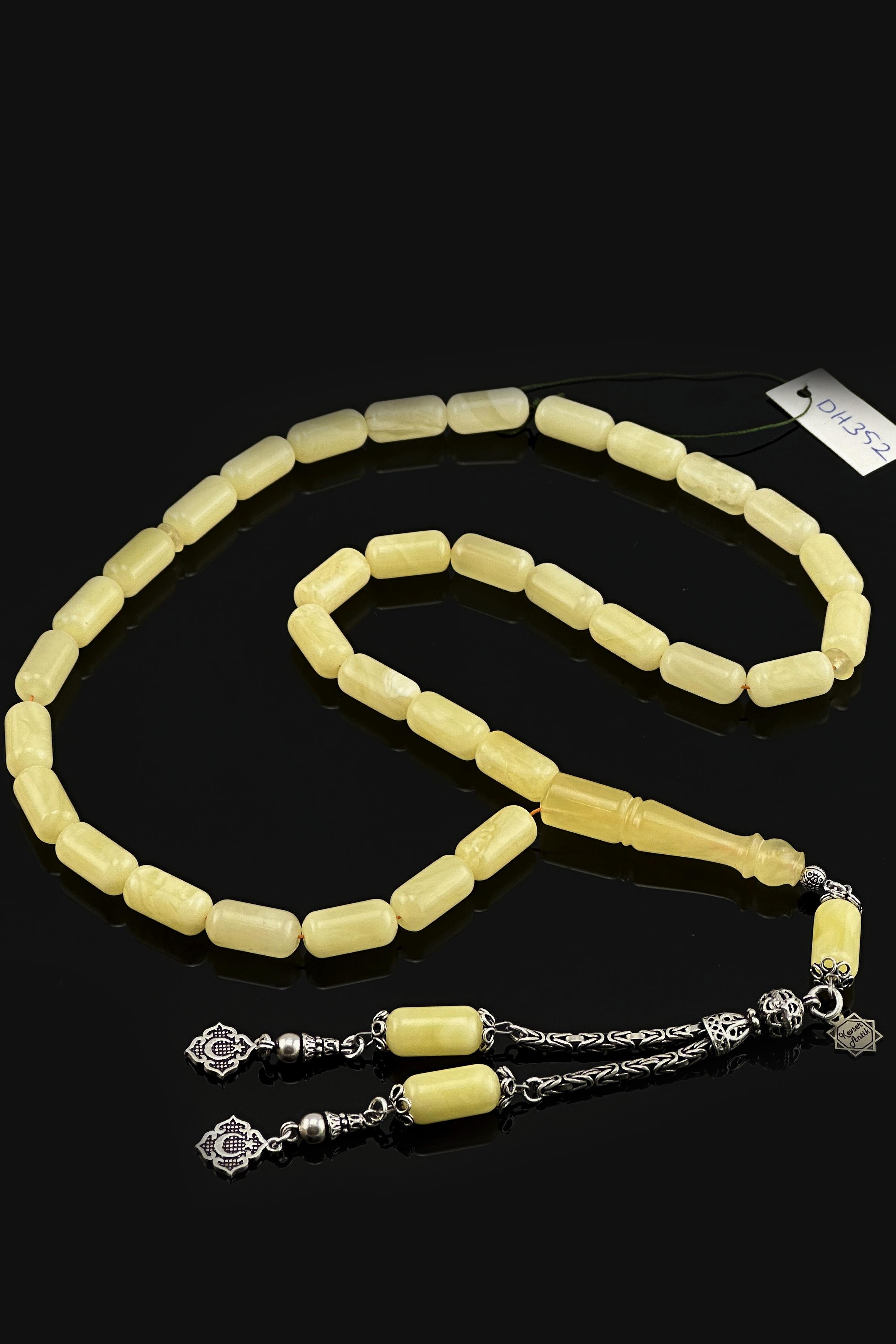 Üst Düzey İşçilikli Kehribar TesbihÜst Düzey İşçilikli Kehribar Tesbih - Kevser AntikDamla Kehribar Tesbihler