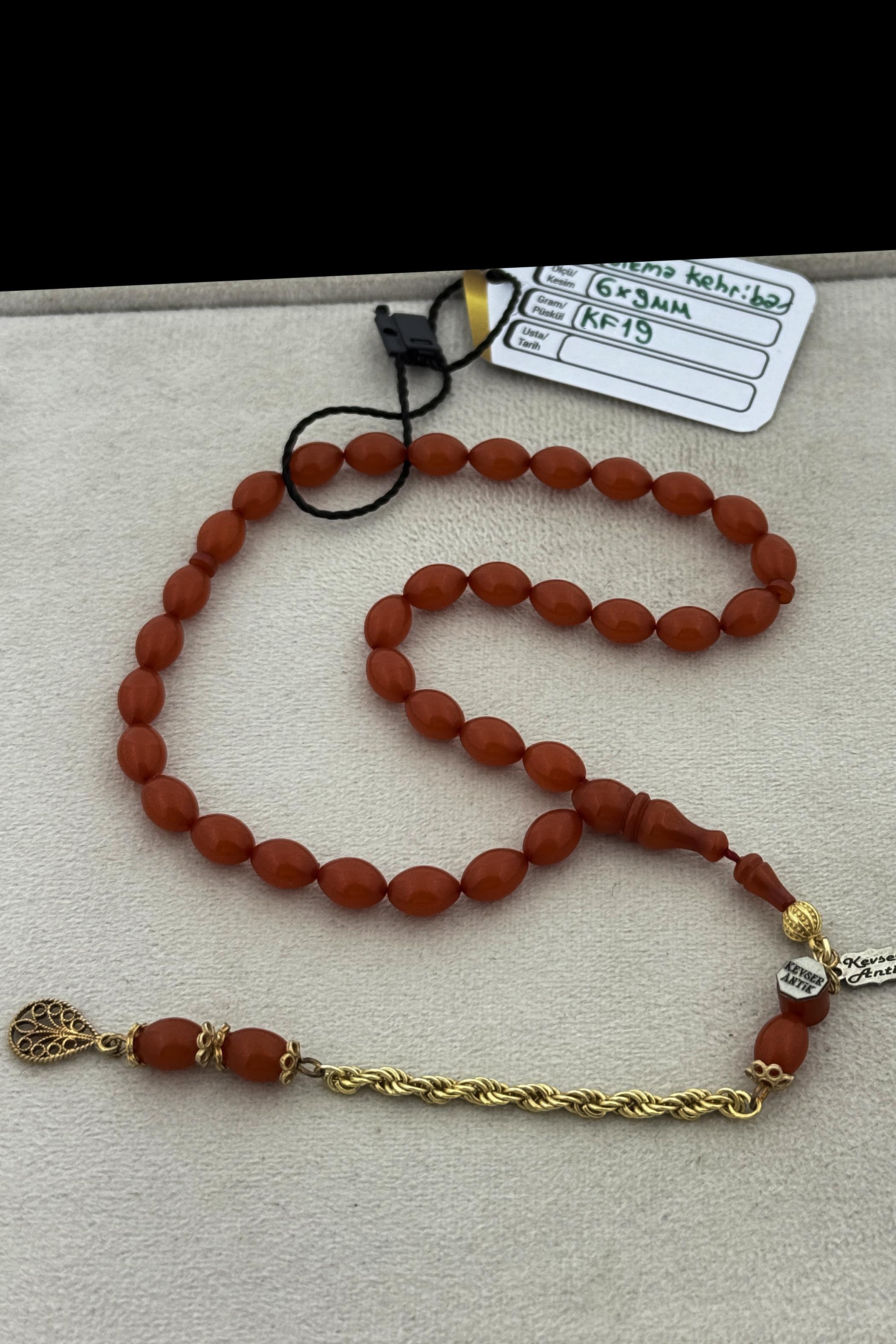 Usta Elinden Zar Kehribar Tesbih – Duru GörünümUsta Elinden Zar Kehribar Tesbih – Duru Görünüm - Kevser AntikSıkma-Ateş Kehribar Tesbihler