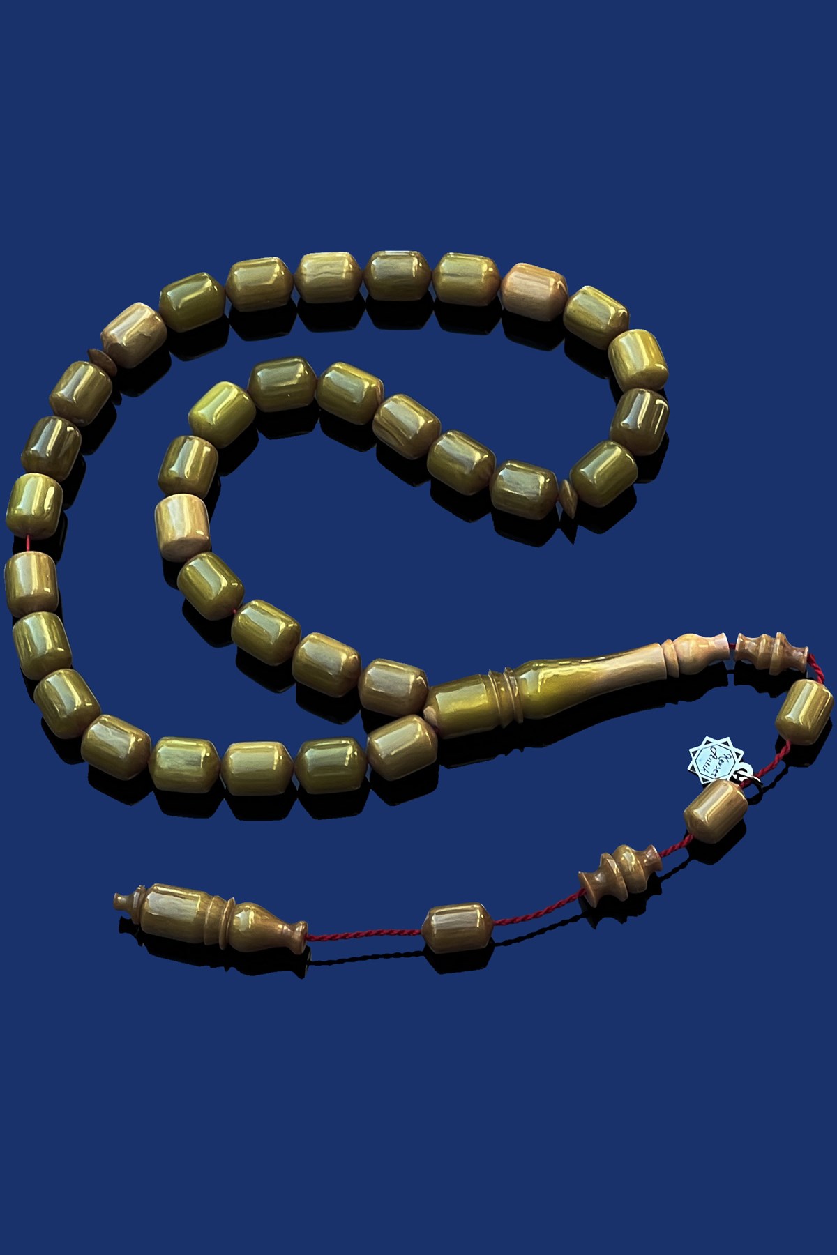 Usta işçilikli Sıkma Kehribar TesbihUsta işçilikli Sıkma Kehribar Tesbih - Kevser AntikSıkma-Ateş Kehribar Tesbihler