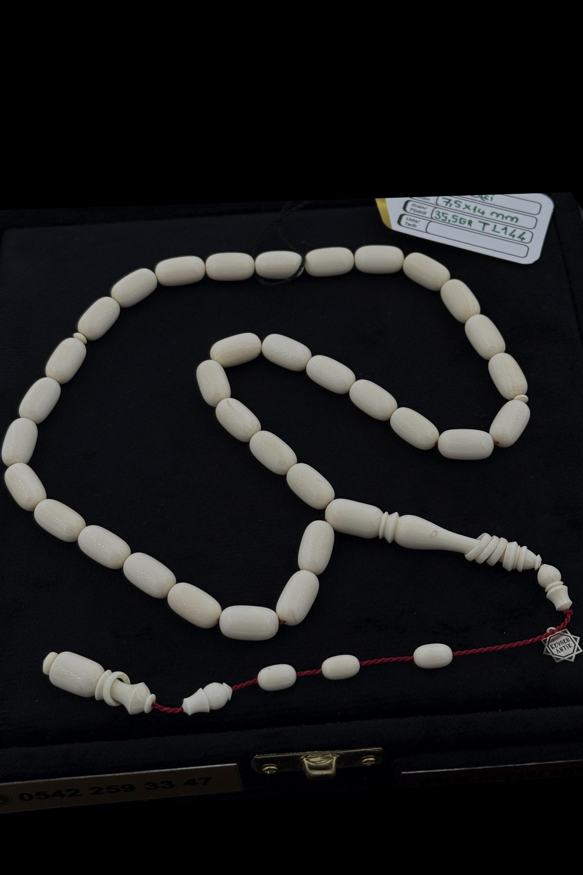 Vip İşçilikli Fildişi TesbihUsta İşçilikli Fildişi Tesbih - Kevser AntikÖZEL SERİ TESBİHLER