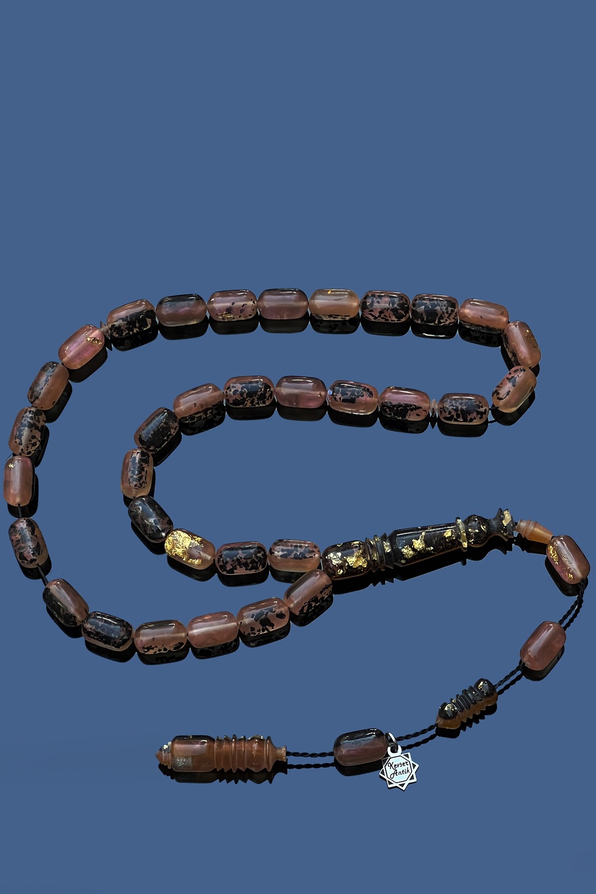 Yenilebilir Sertifikalı Altın Parçacıklı Sıkma Kehribar TesbihYenilebilir Sertifikalı Altın Parçacıklı Sıkma Kehribar Tesbih - Kevser AntikSıkma-Ateş Kehribar Tesbihler