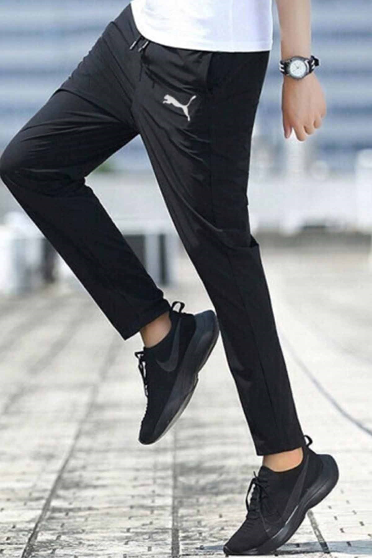 PUMAEşofman AltPuma Sıdelıne Pants Erkek Eşofman Alt 657327-03 SIYAH