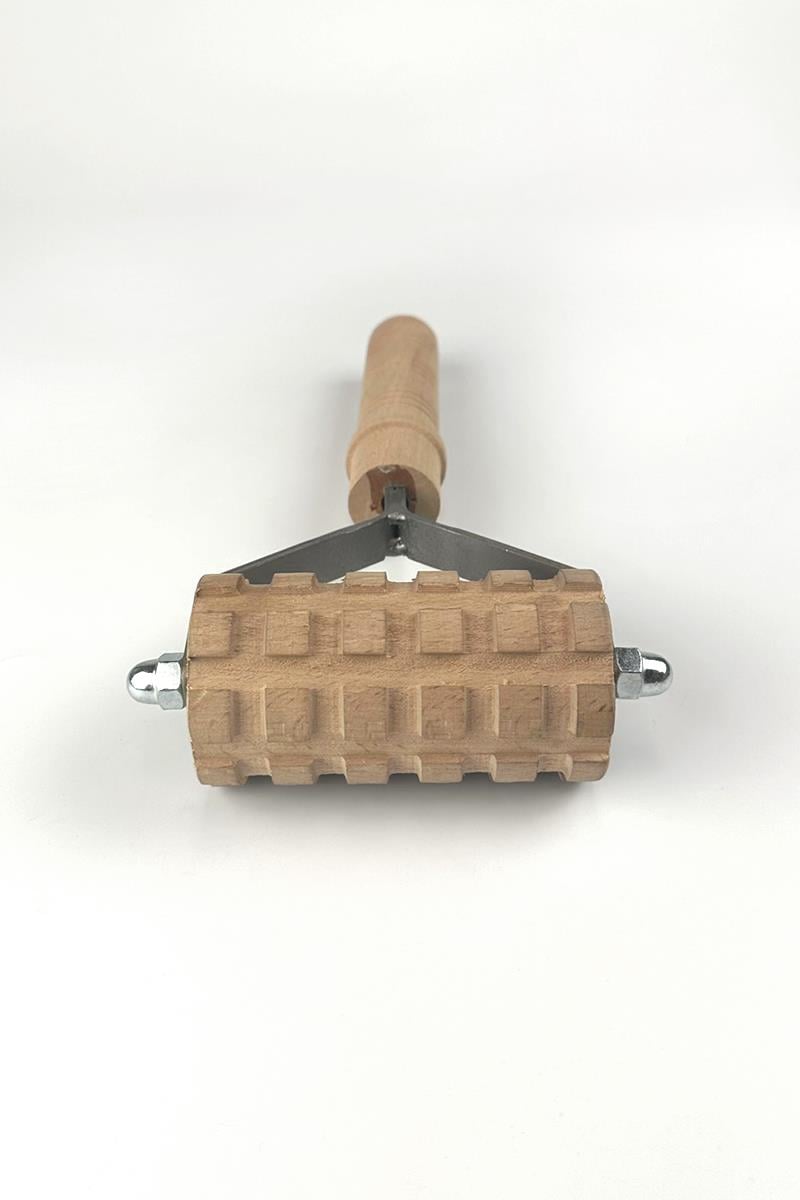 Деревянный каток для формирования осадка