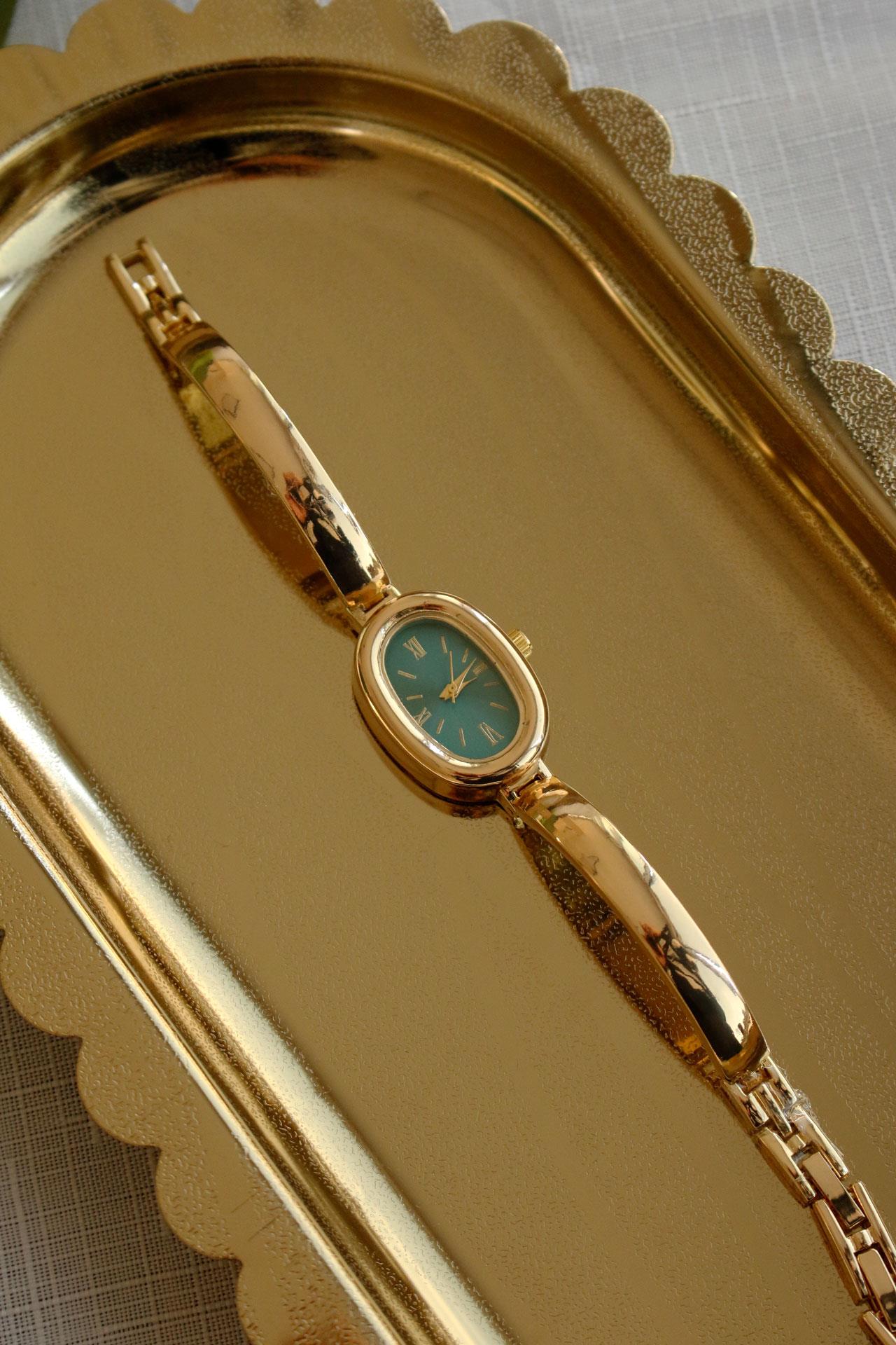 Sarelia Yuvarlak Bileklik Gold Metal Kadın Kol Saati