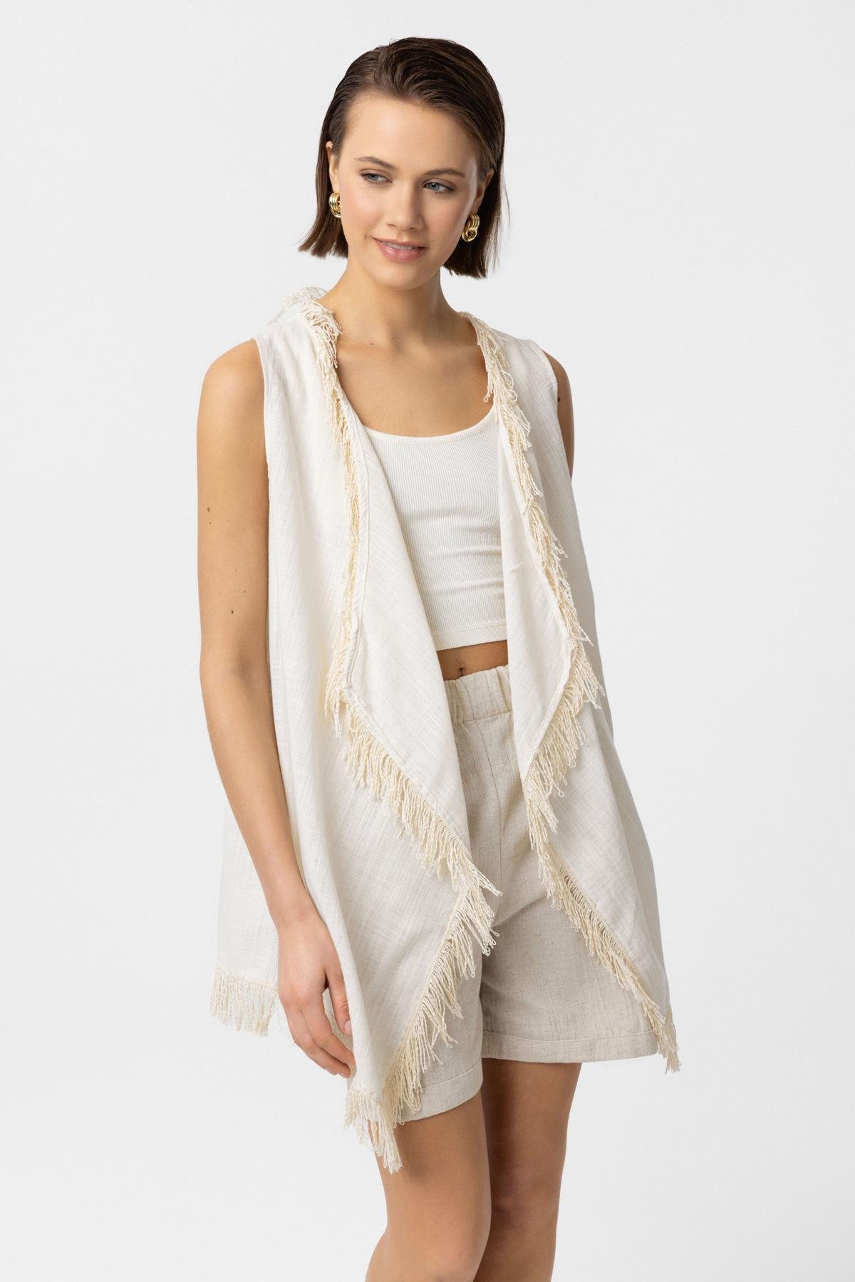 Krem Asimetrik Kesim Püsküllü Pamuklu Yelek