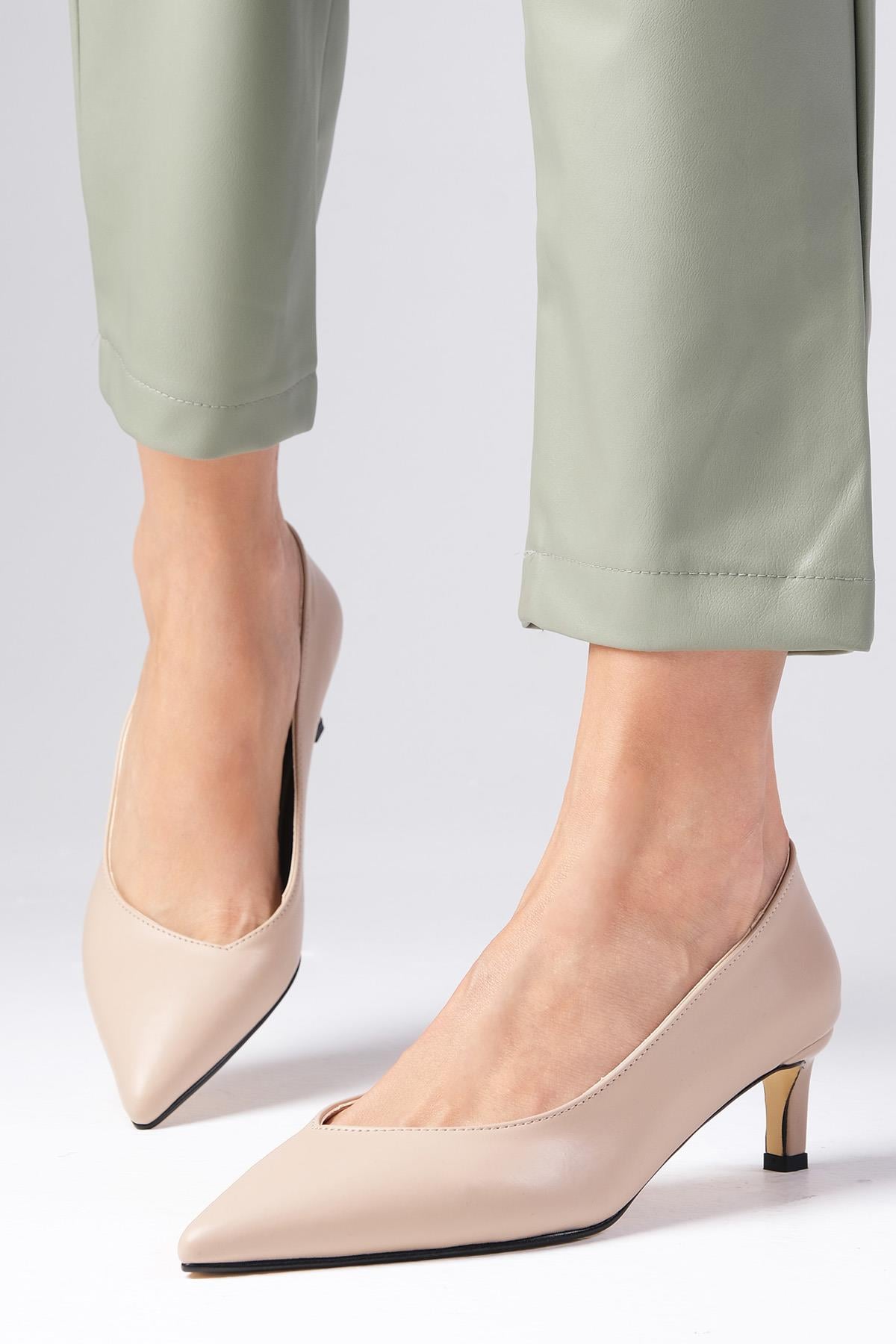 Livia Tan Heels