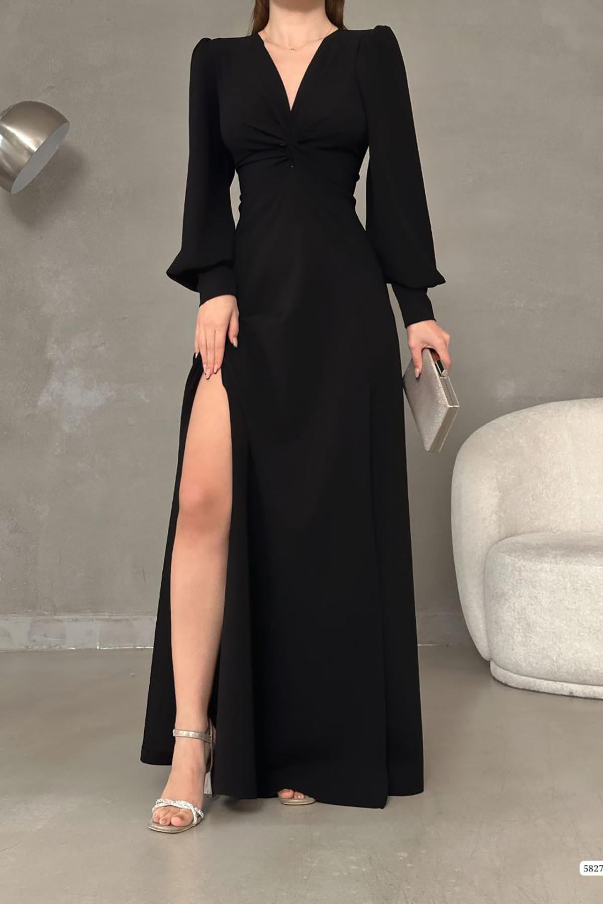 Siyah Krep Kumaş Önü Düğüm Detay Maxi Boy Uzun Kollu Yırtmaçlı Elbise