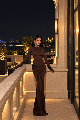 Kahverengi Uzun Kollu Boğazlı Bel Tasarımlı Maxi Boy Sandy Kumaş Elbise