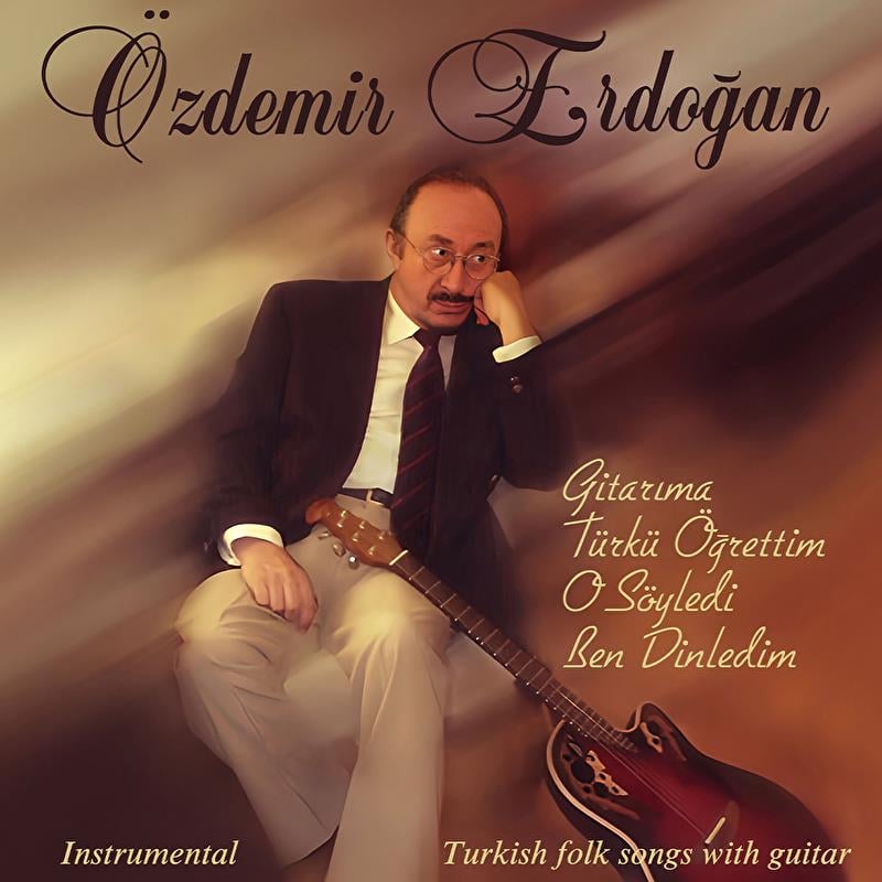ozdemir-erdogan-gitarima-turku-ogretti-0a-077.jpg