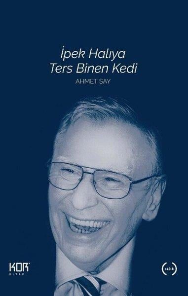 Ahmet SayTürkiye Romanİpek Halıya Ters Binen Kedi