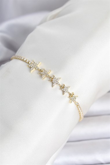 Pirinç Gold Renk Sıralı Yıldız Model Su Yolu Kadın Bileklik