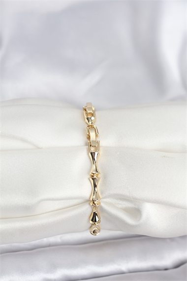 Pirinç Gold Renk VIP Seri Kemik Model Zirkon Taşlı Kadın Bileklik