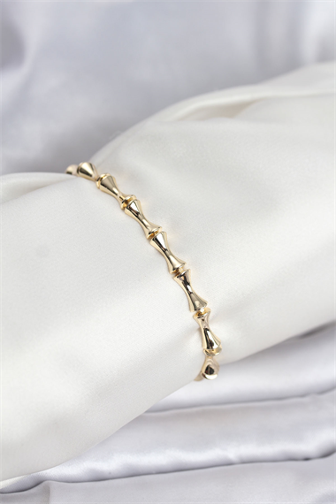 Pirinç Gold Renk VIP Seri Kemik Model Zirkon Taşlı Kadın Bileklik