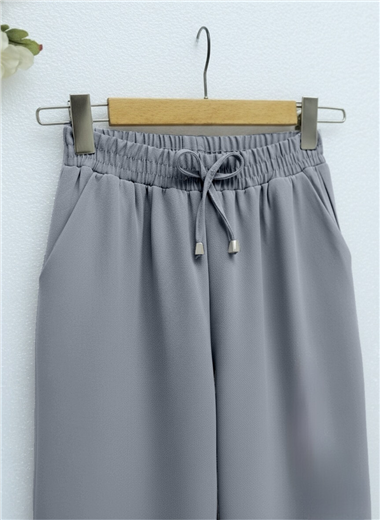 Beli Bağcıklı Dar Paça Pantolon    -Füme