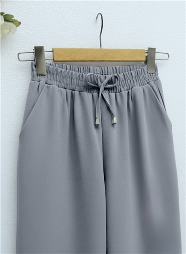 Beli Bağcıklı Dar Paça Pantolon    -Füme