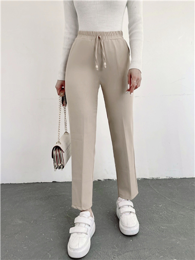 بنطال مطاطي بخصر مزدوج ومزين بالدانتيل - بيج