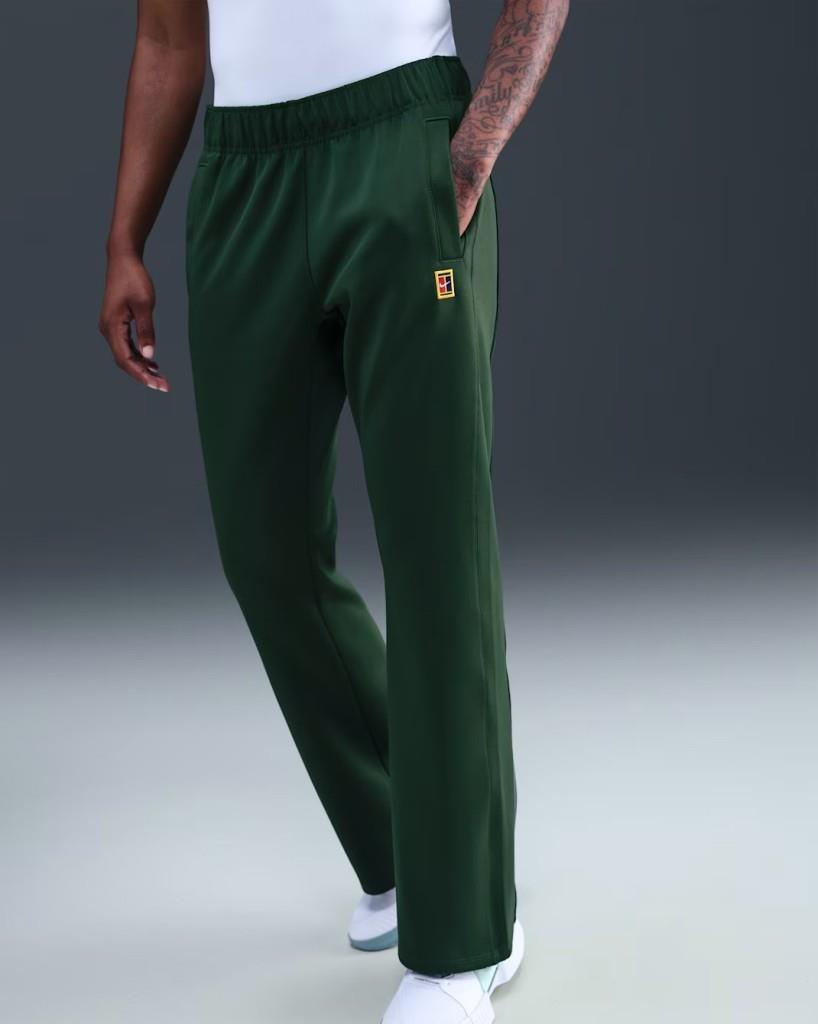 NikeCourt FZ6509-323 Heritage Windrunner Normal Belli Kadın Tenis Pantolonu - Yeşil