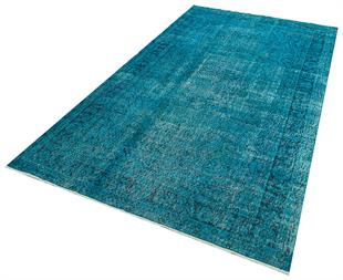 GERÇEK EL DOKUMA TURKUAZ RENGİ GÖBEKLİ DESEN VİNTADE HALI