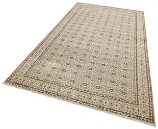 GENELEKSEL EL DOKUMA BEJ KAHVERENGİ ÇİÇEKLİ DESEN YÜN SALON HALISI