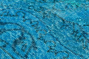 GERÇEK EL DOKUMA TURKUAZ RENGİ GÖBEKLİ DESEN VİNTADE HALI