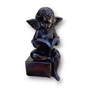 Oturan Melek Figürü