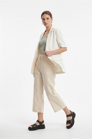 Kadın Siyah Çapraz Bantlı Dolgu Topuklu Hakiki Deri Sandalet