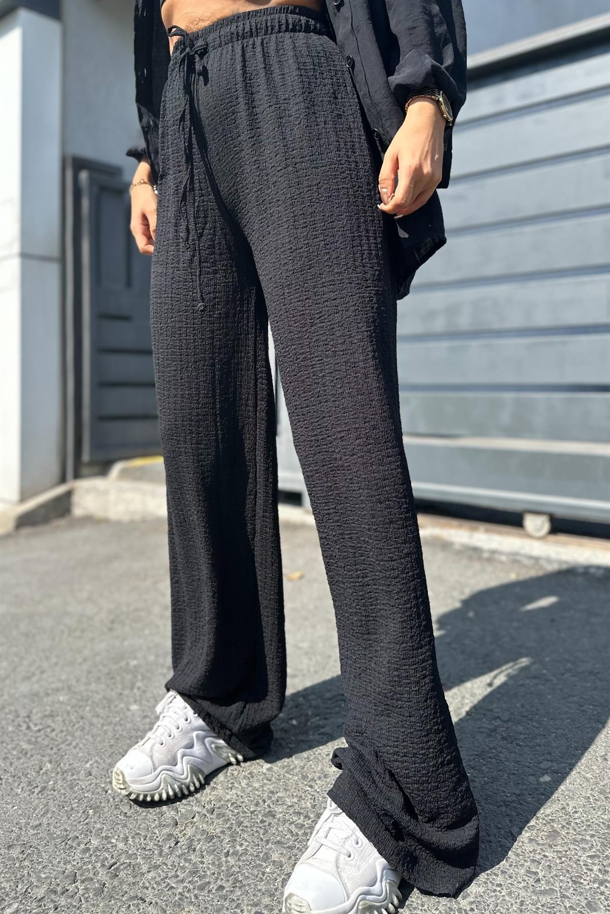 Siyah Beli Lastikli Bürümcük PantolonHer şey 250TL