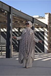 Kadın Bisiklet Yaka Asimetrik Kesim Yarasa Kol Panço