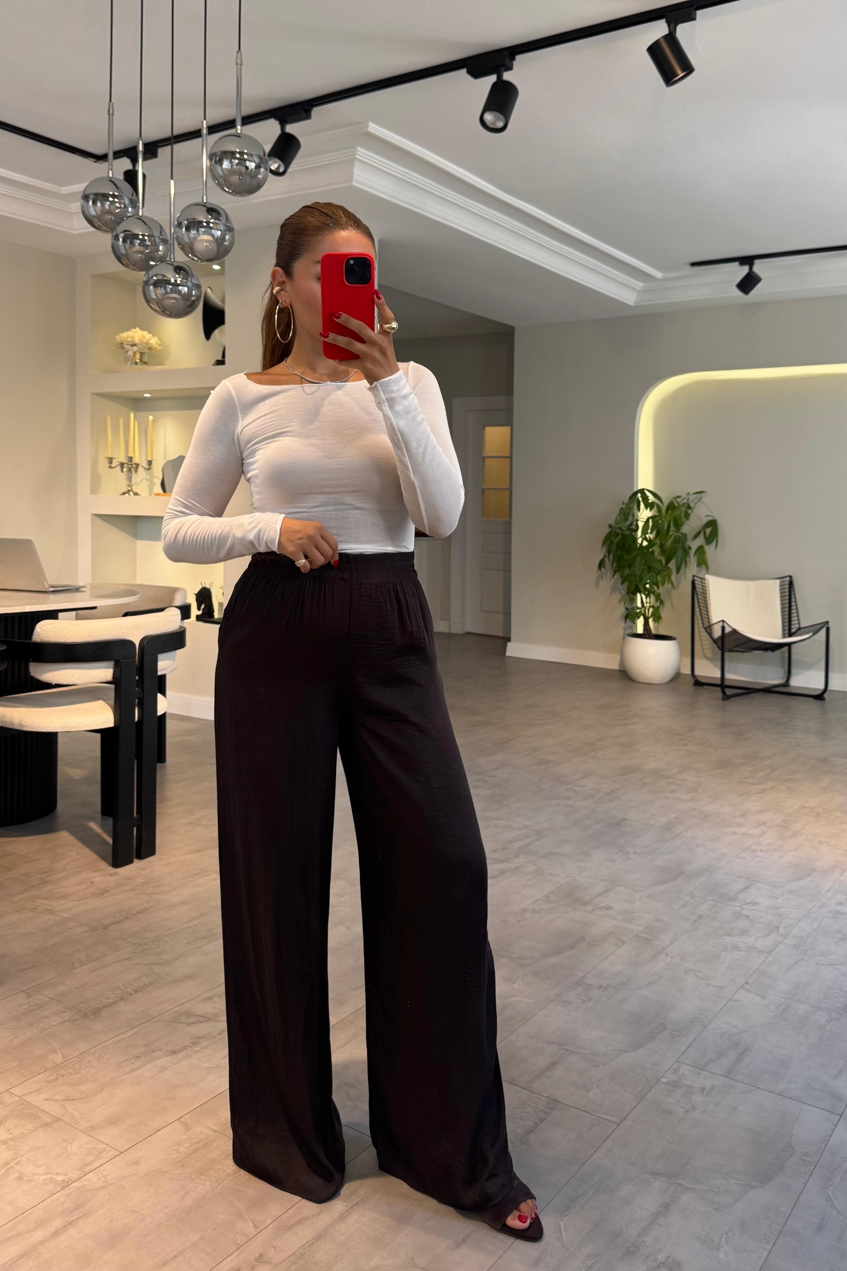 BELİ LASTİKLİ DÖKÜMLÜ BOL PAÇA PANTOLON