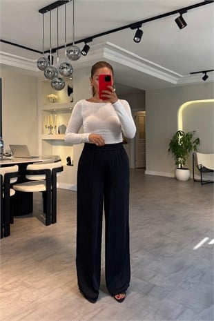 BELİ LASTİKLİ DÖKÜMLÜ BOL PAÇA PANTOLON