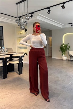 BELİ LASTİKLİ DÖKÜMLÜ BOL PAÇA PANTOLON