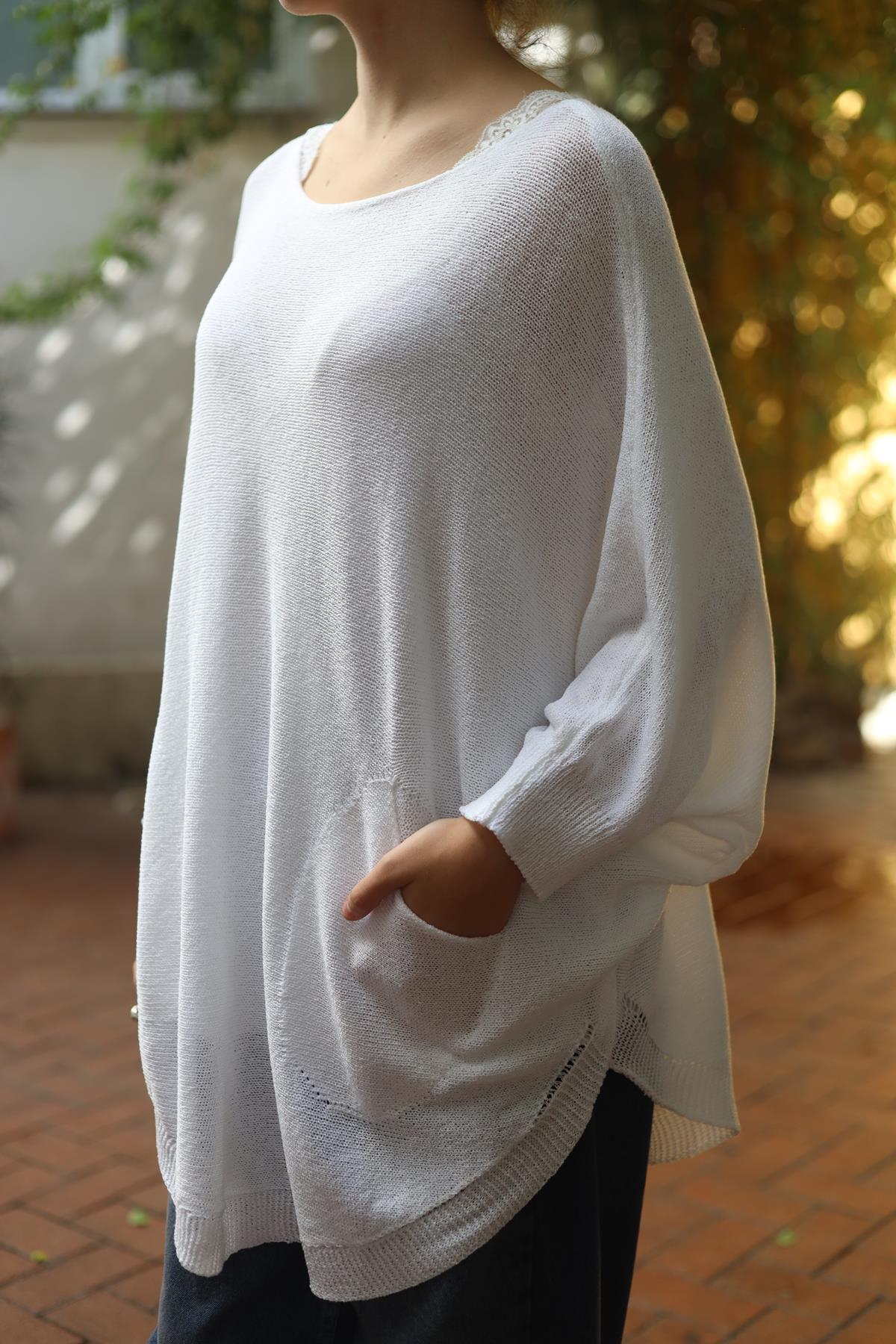 Beyaz Oval Kesim Cepli Triko Tunik