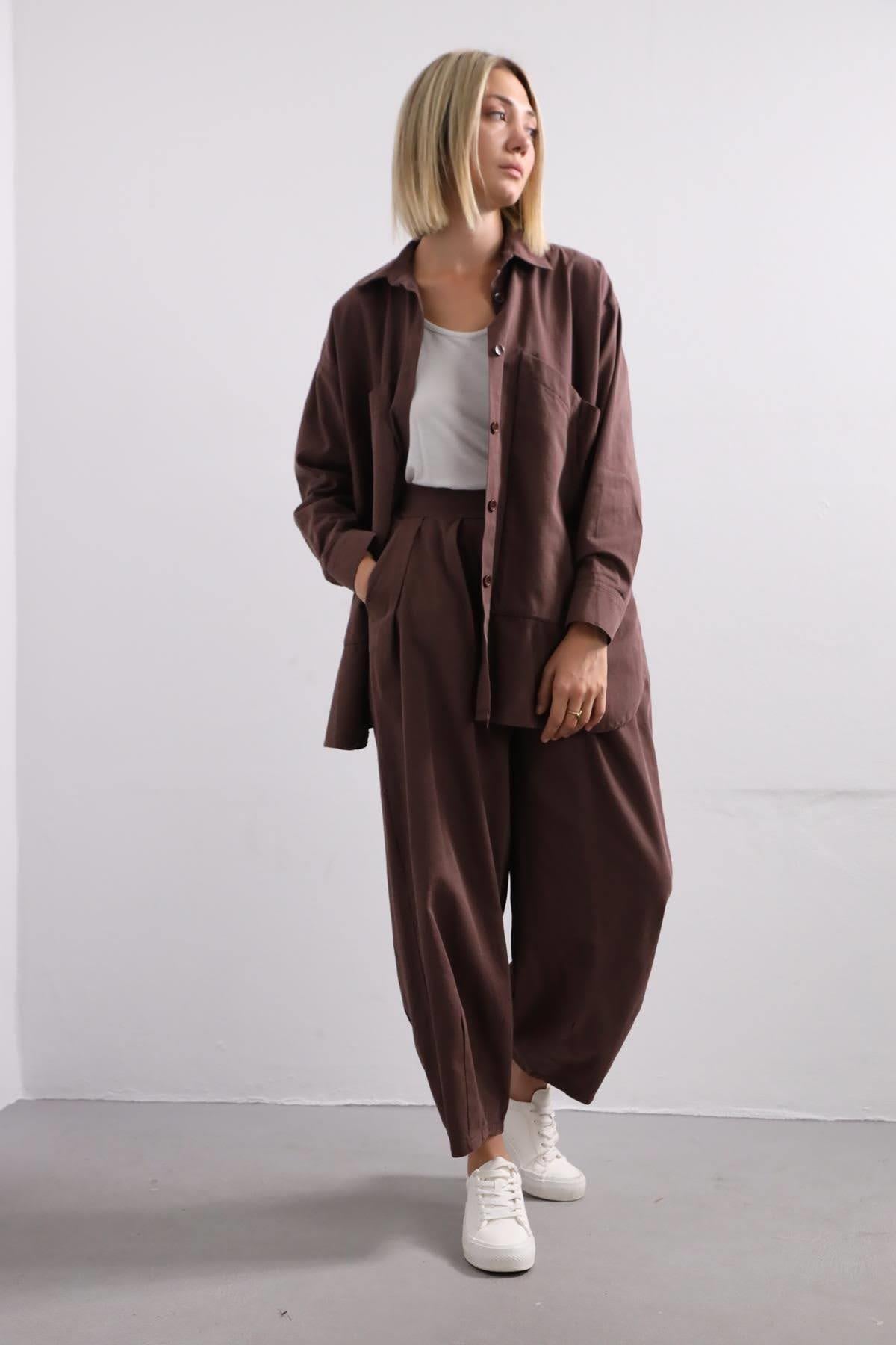 Koyu Kahverengi Paçadan Pileli Salaş Pantolon - Şaman Butik - Bohem Giyim ve Aksesuar | Kadın & Erkek Koyu Kahverengi Paçadan Pileli Salaş Pantolon