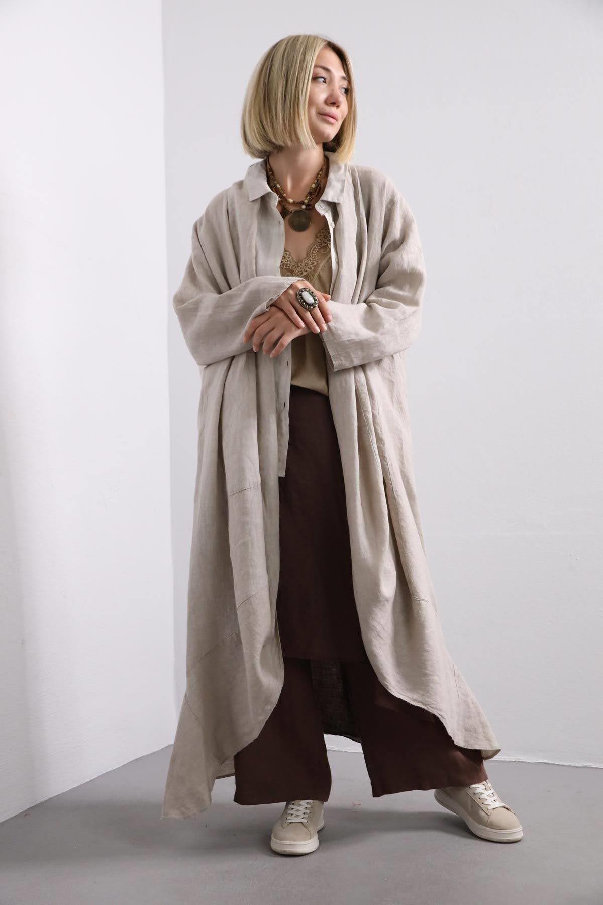 Krem Rengi Cepli Arkası Dikiş Detaylı Keten Kaftan - Şaman Butik Krem Rengi Cepli Arkası Dikiş Detaylı Keten Kaftan