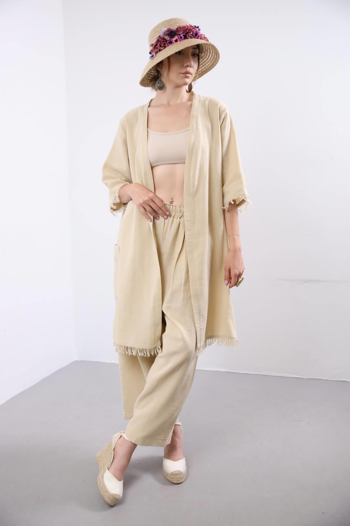 Krem Rengi Saçaklı Müslin Kaftan - Şaman Butik Krem Rengi Saçaklı Müslin Kaftan