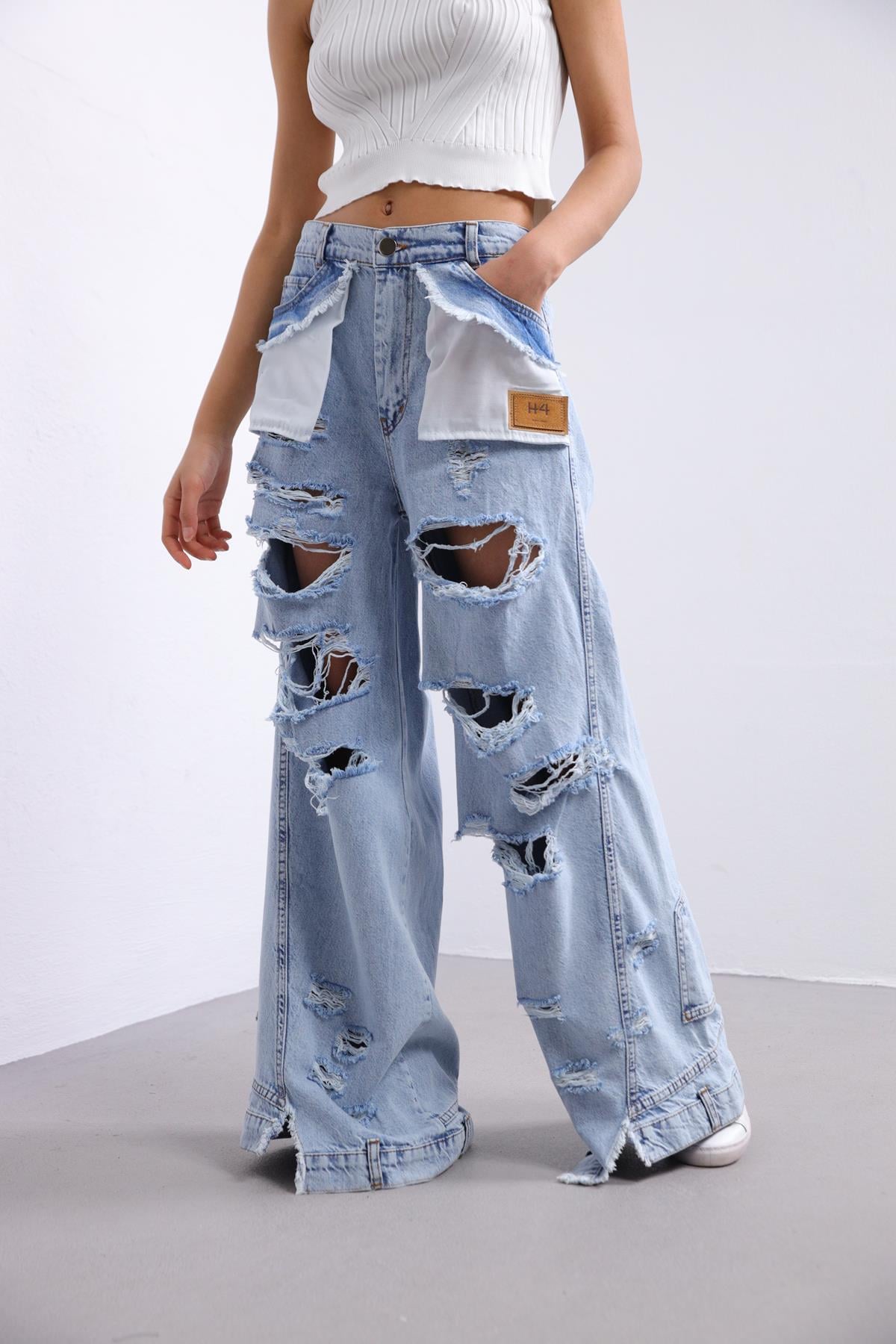 Mavi Yırtık Detay Cebi Parça Detay Jean Pantolon - Şaman Butik Mavi Yırtık Detay Cebi Parça Detay Jean Pantolon