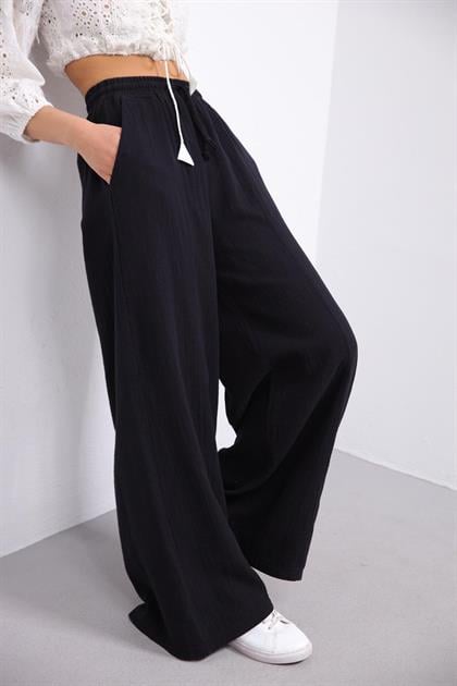 Siyah Bol Paça Önden Çimalı Pantolon - Şaman Butik Siyah Bol Paça Önden Çimalı Pantolon