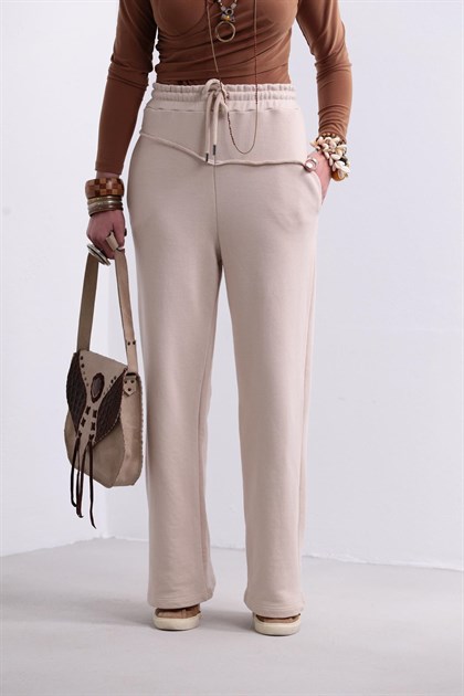 Taş Rengi Asimetrik Kesme Detaylı Beli Lastikli Pantolon - Şaman Butik - Bohem Giyim ve Aksesuar | Kadın & Erkek Taş Rengi Asimetrik Kesme Detaylı Beli Lastikli Pantolon