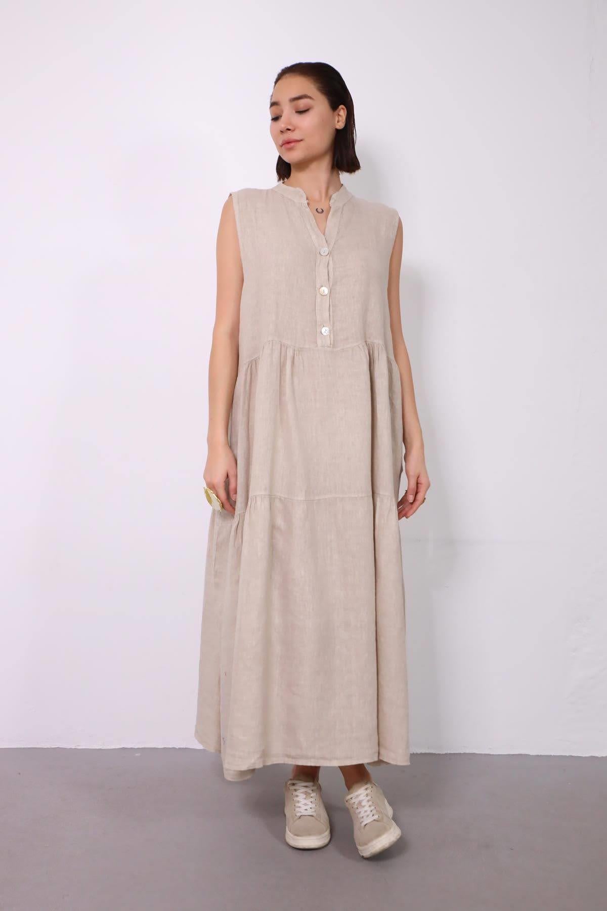 Krem Rengi Hakim Yaka Parça Detaylı Kolsuz Elbise - Şaman Butik Krem Rengi Hakim Yaka Parça Detaylı Kolsuz Elbise