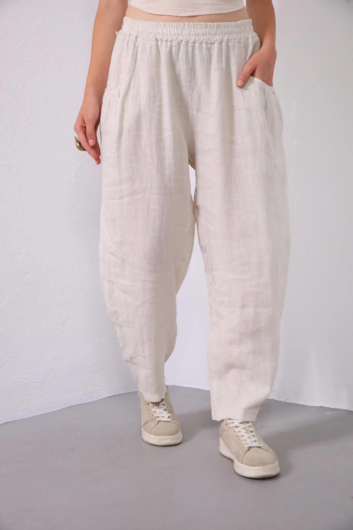 Krem Rengi Cepleri Pileli Beli Lastikli Keten Pantolon - Şaman Butik Krem Rengi Cepleri Pileli Beli Lastikli Keten Pantolon