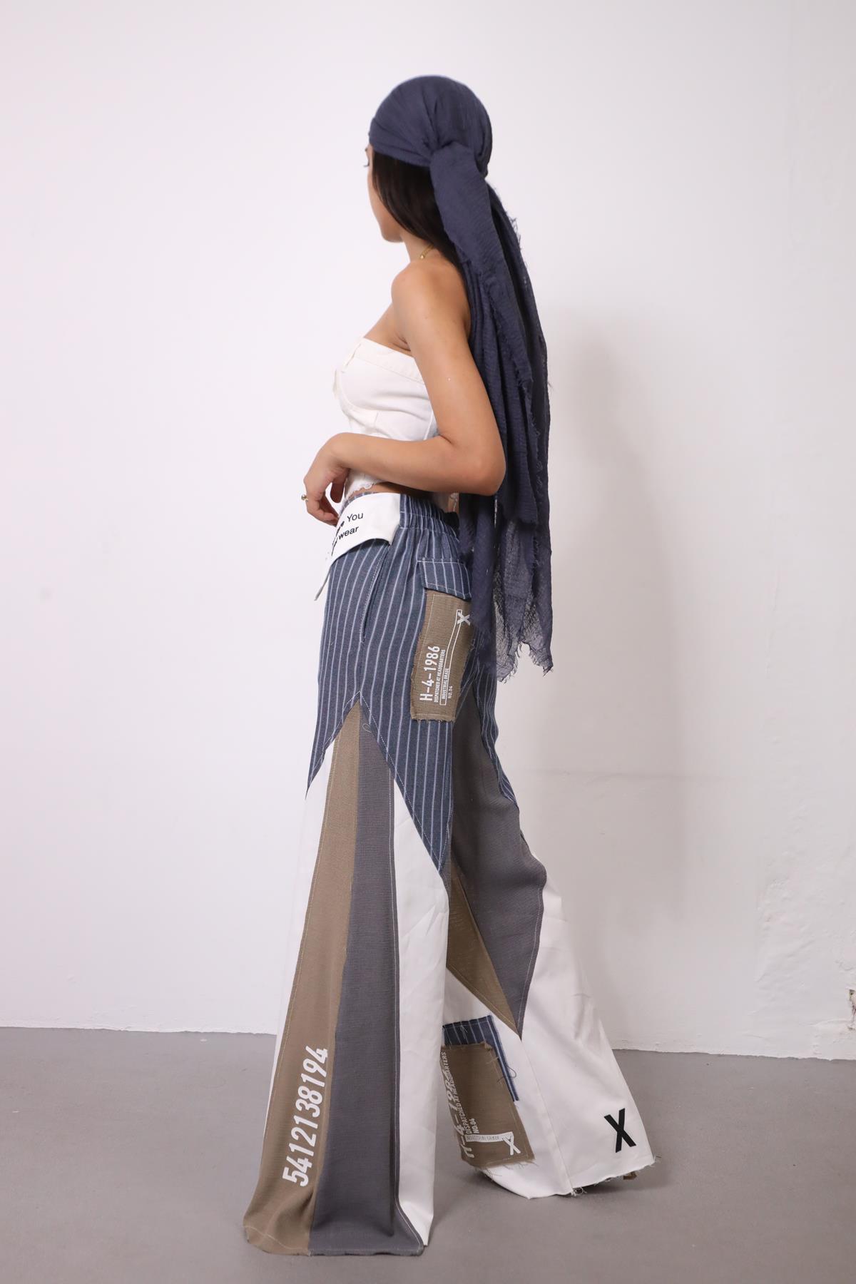  İndigo Mavi Çizgili Parça ve Yazı Detaylı Pantolon