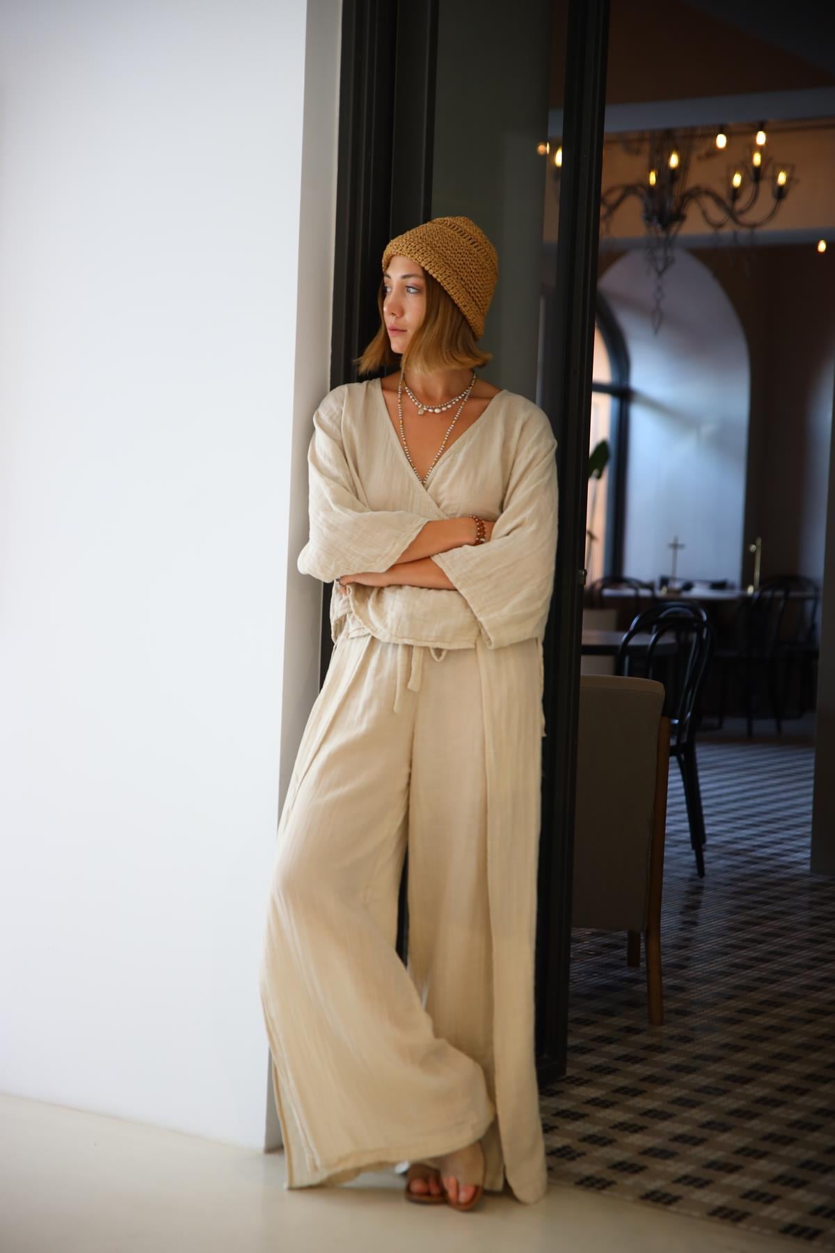 Krem Rengi Beli İpli Parça Detaylı Yırtmaçlı Pantolon - Şaman Butik - Bohem Giyim ve Aksesuar | Kadın & Erkek Krem Rengi Beli İpli Parça Detaylı Yırtmaçlı Pantolon