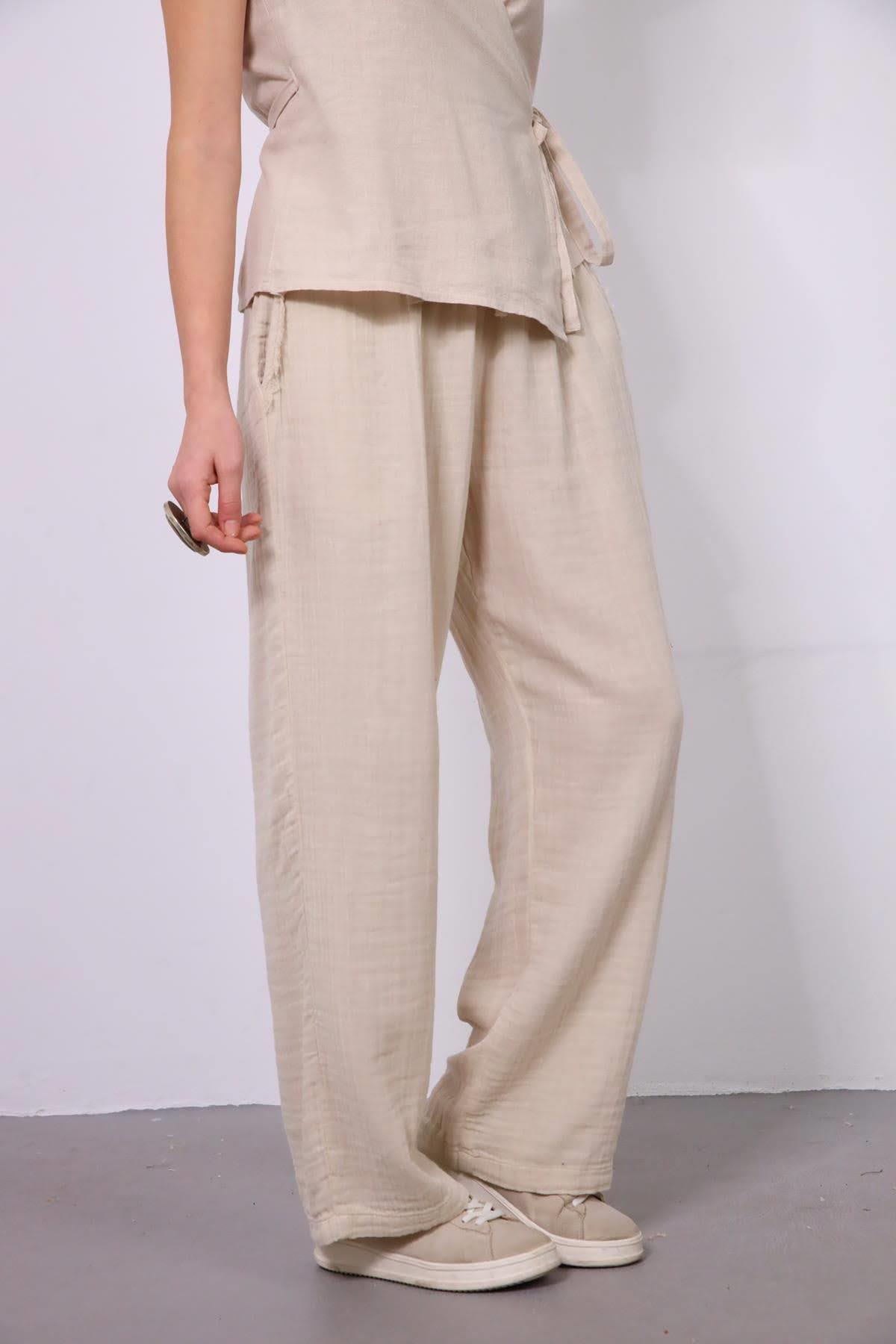 Bej Cebi Püskül Detaylı Müslin Pantolon - Şaman Butik Bej Cebi Püskül Detaylı Müslin Pantolon