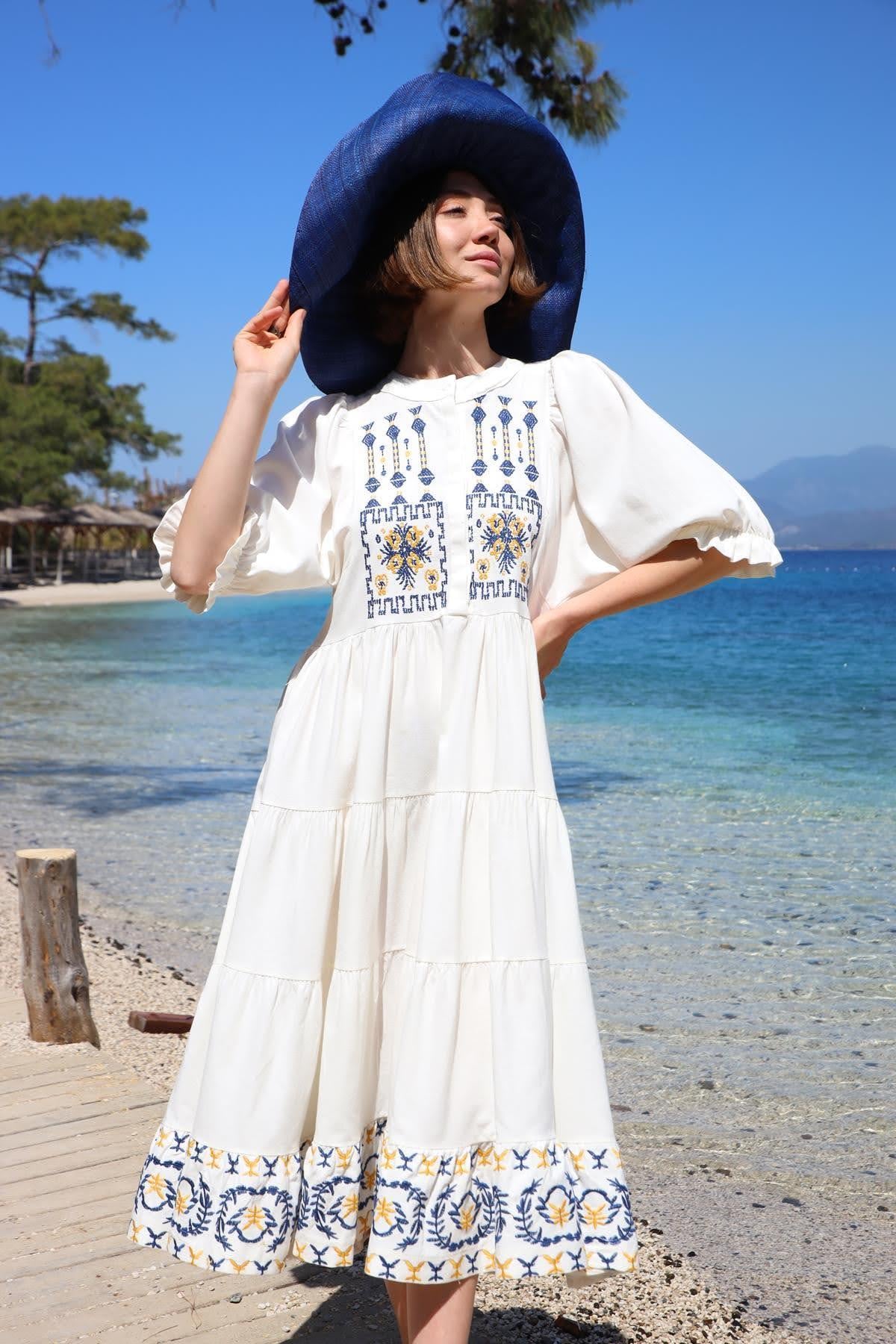 Beyaz Düğmeli Bisiklet Yaka Kolları Fırfırlı Uzun Elbise - Şaman Butik Beyaz Düğmeli Bisiklet Yaka Kolları Fırfırlı Uzun Elbise