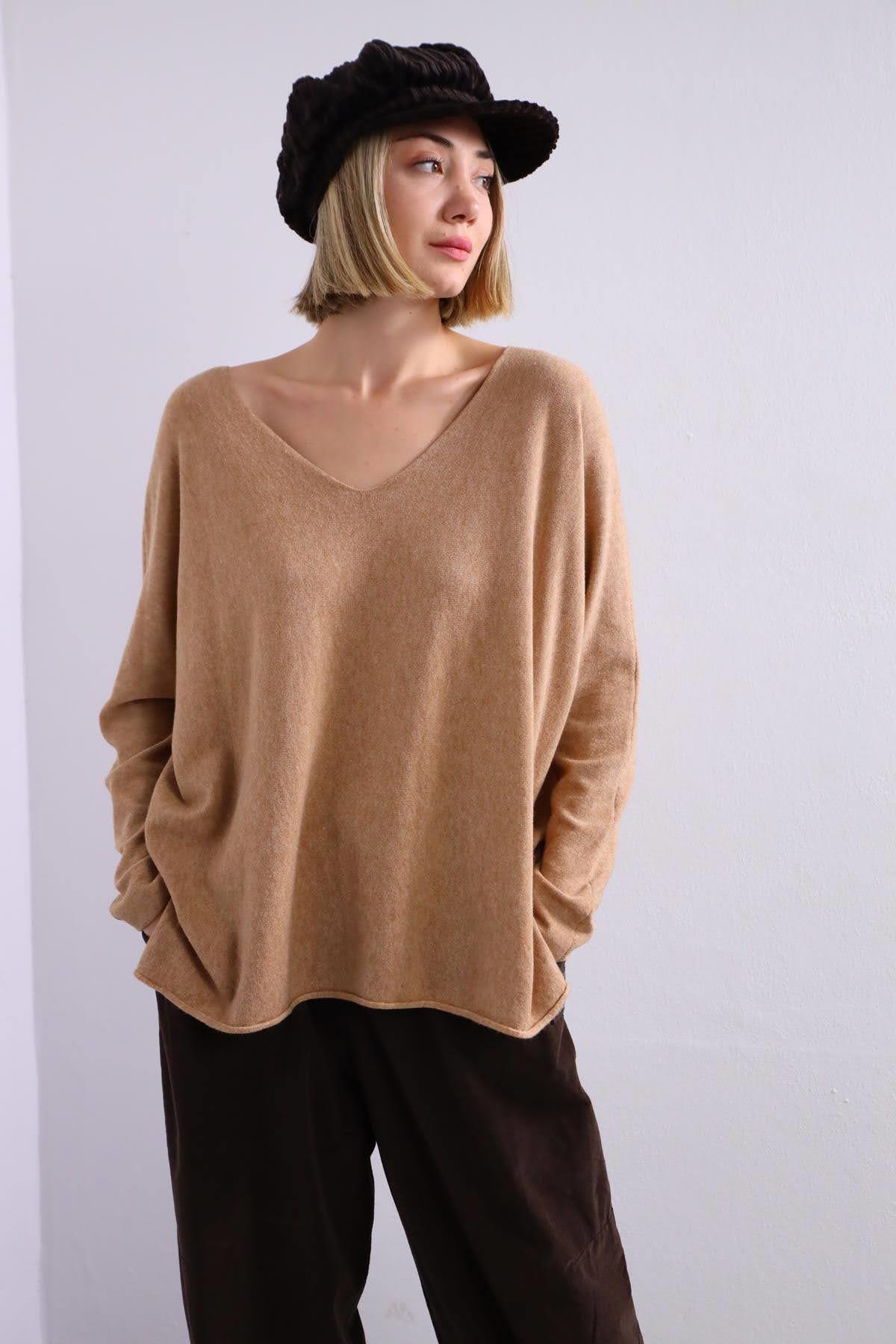 Krem Rengi Yumuşak Doku Yırtmaç Detaylı Bluz - Şaman Butik Krem Rengi Yumuşak Doku Yırtmaç Detaylı Bluz