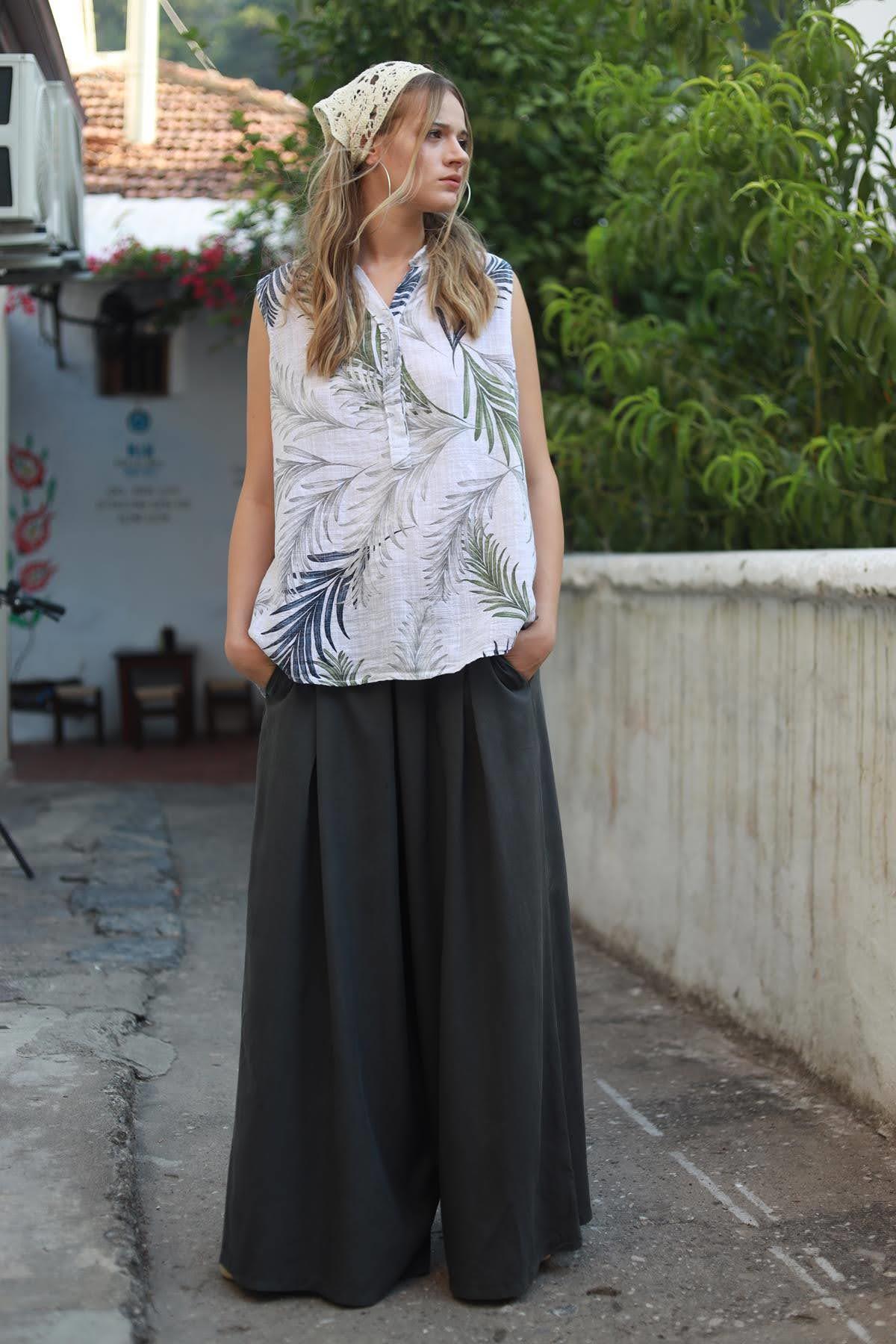 White Floral Patterned Three Buttoned Sleeveless Shirt