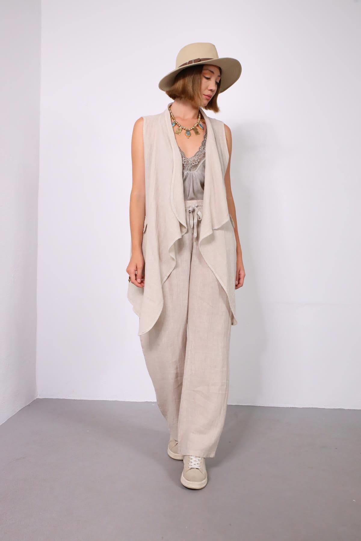 Krem Rengi Asimetrik Kesim Sırtı Büzgülü Keten Yelek - Şaman Butik Krem Rengi Asimetrik Kesim Sırtı Büzgülü Keten Yelek